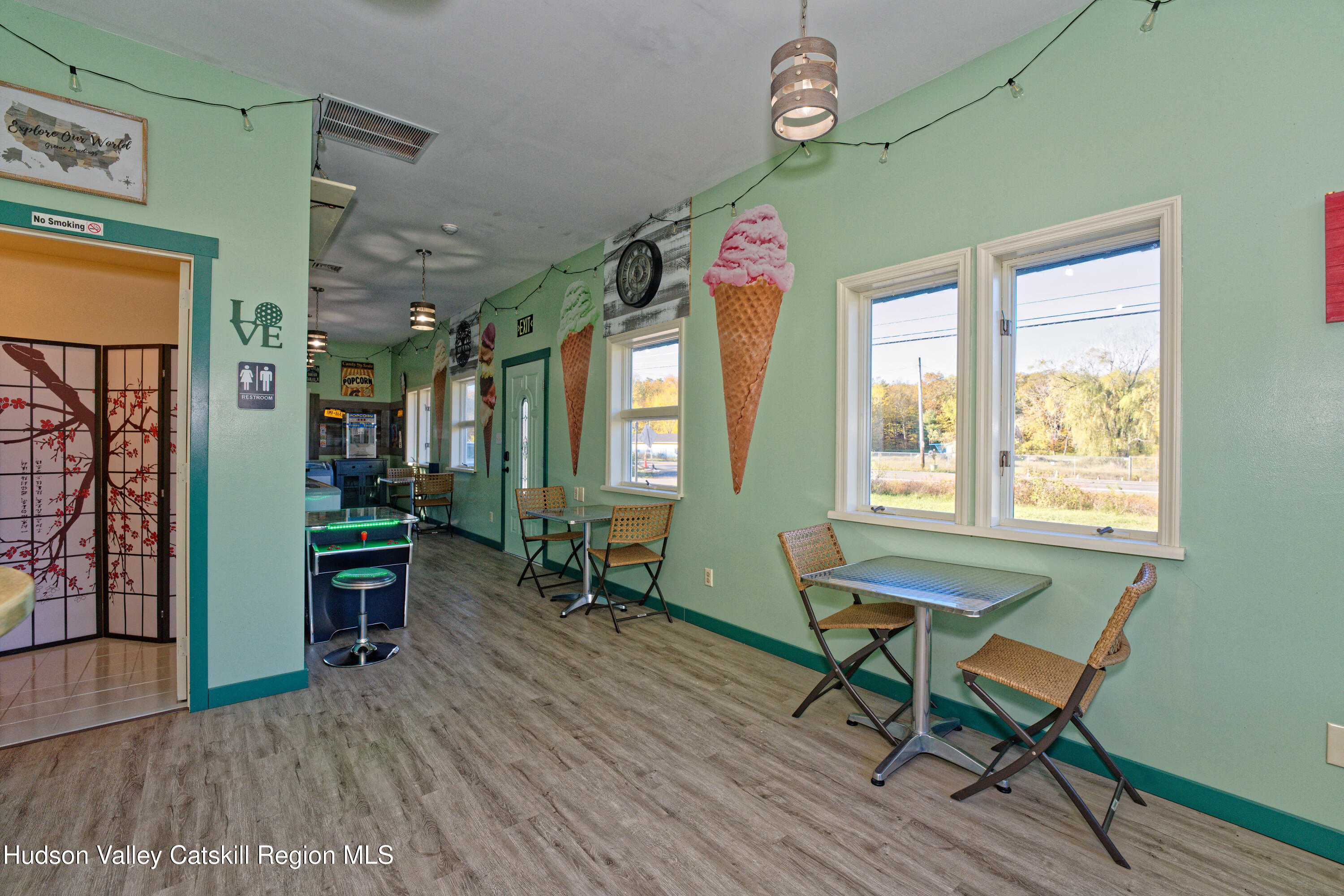 7426 Highway 32 Cairo, NY 12413 - Photo 9 of 49 a living room with furniture and a wooden floor