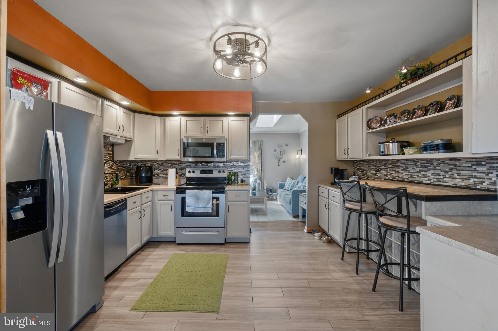 7113 Olivia Road Baltimore, MD 21220 - Photo 22 of 30 Kitchen with stainless steel appliances
