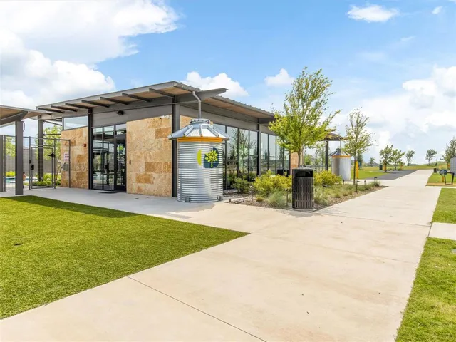 a view of an outdoor space and tennis court