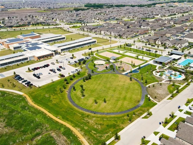 a view of swimming pool with outdoor seating