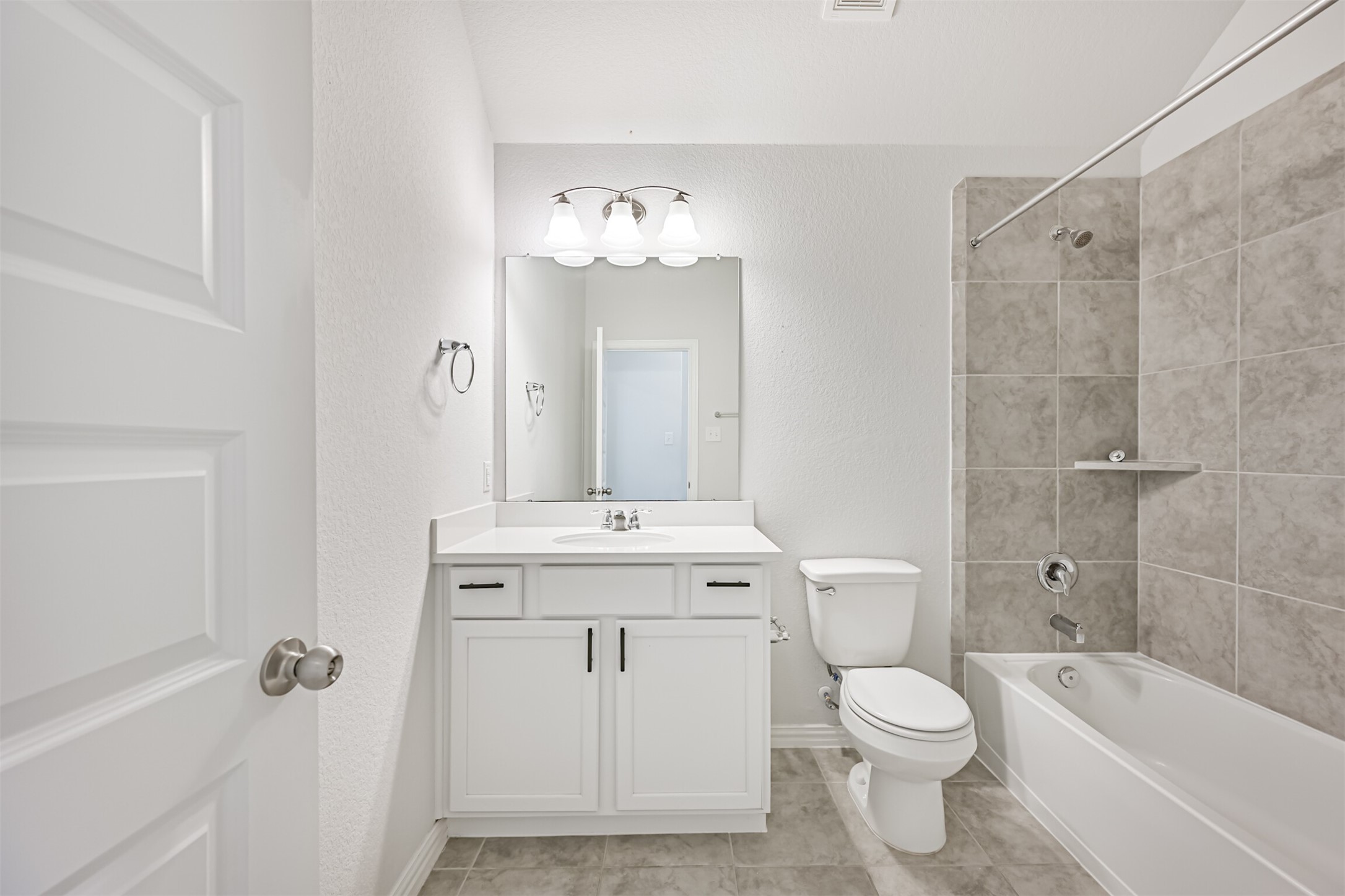 7019 Terra Drive Manvel, TX 77578 - Photo 12 of 41 a bathroom with a sink a toilet and shower