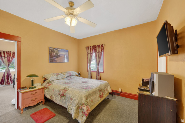 977 23rd Street Ogden, UT 84401 - Photo 8 of 29 Carpeted bedroom with a ceiling fan