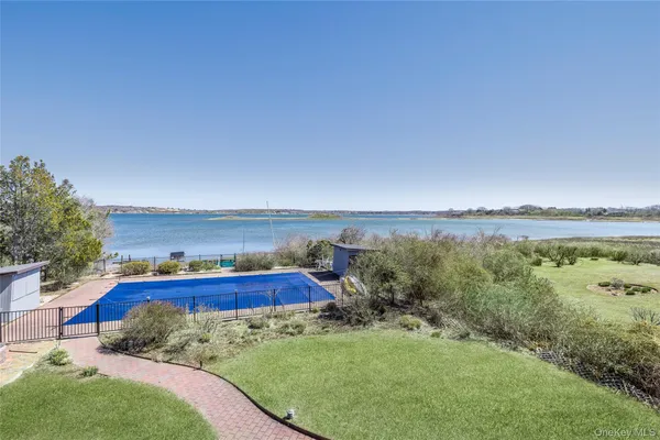 a view of a yard with an ocean
