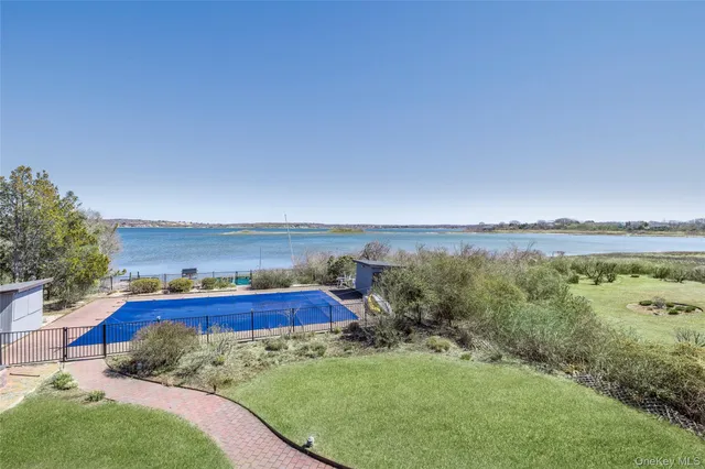 a view of a yard with an ocean