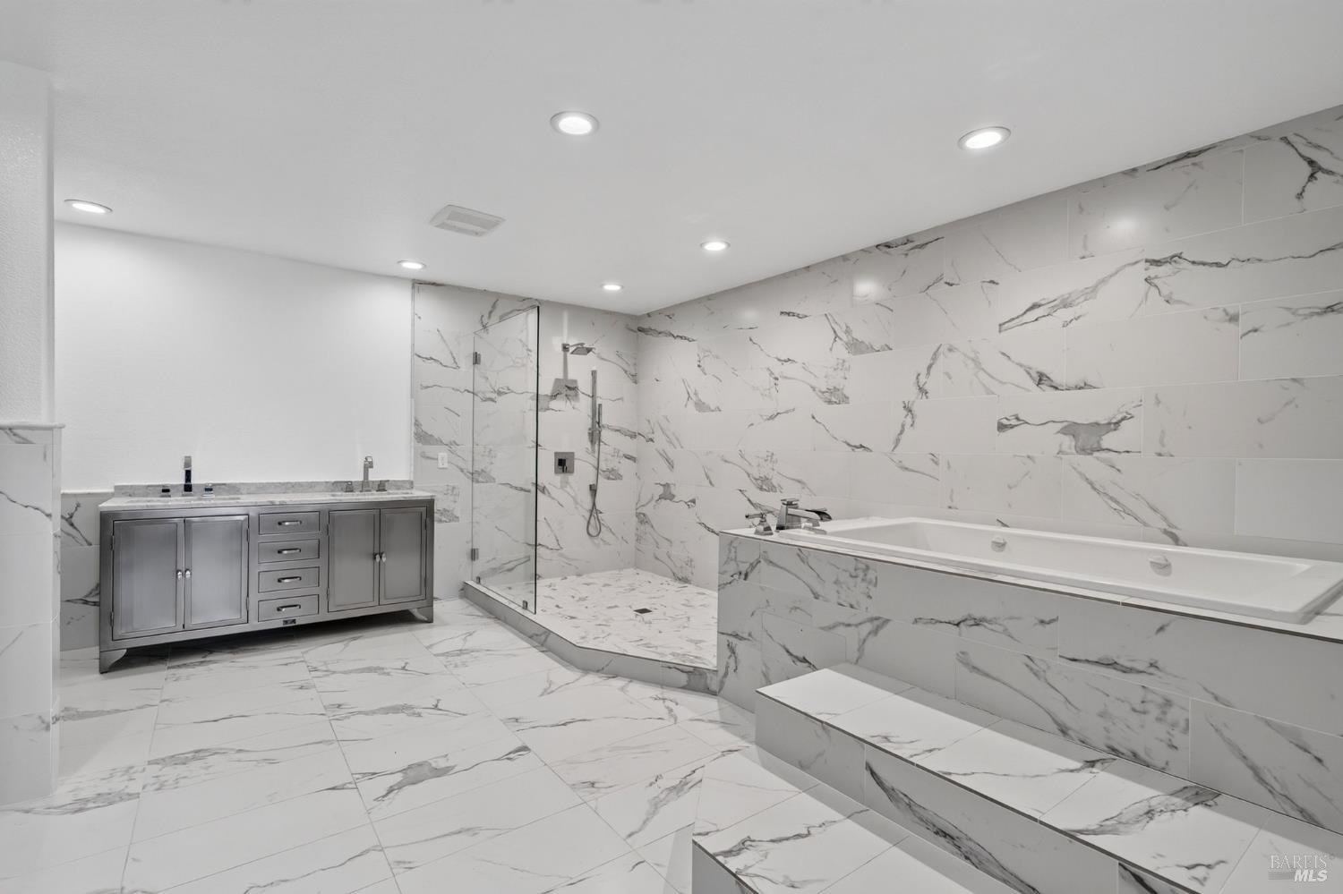 7490 Walnut Lane Lower Lake, CA 95457 - Photo 34 of 66 Beautiful remodeled primary bathroom with huge shower, jetted tub and huge walk in closet.