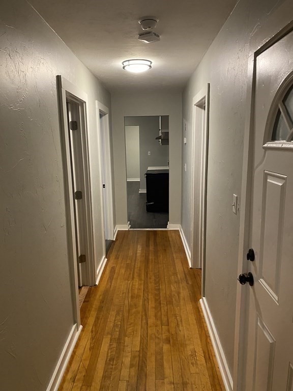 36 Paine Street, Unit 3 Worcester, MA 01605 - Photo 4 of 8 wooden floor in a gallery with wooden floor