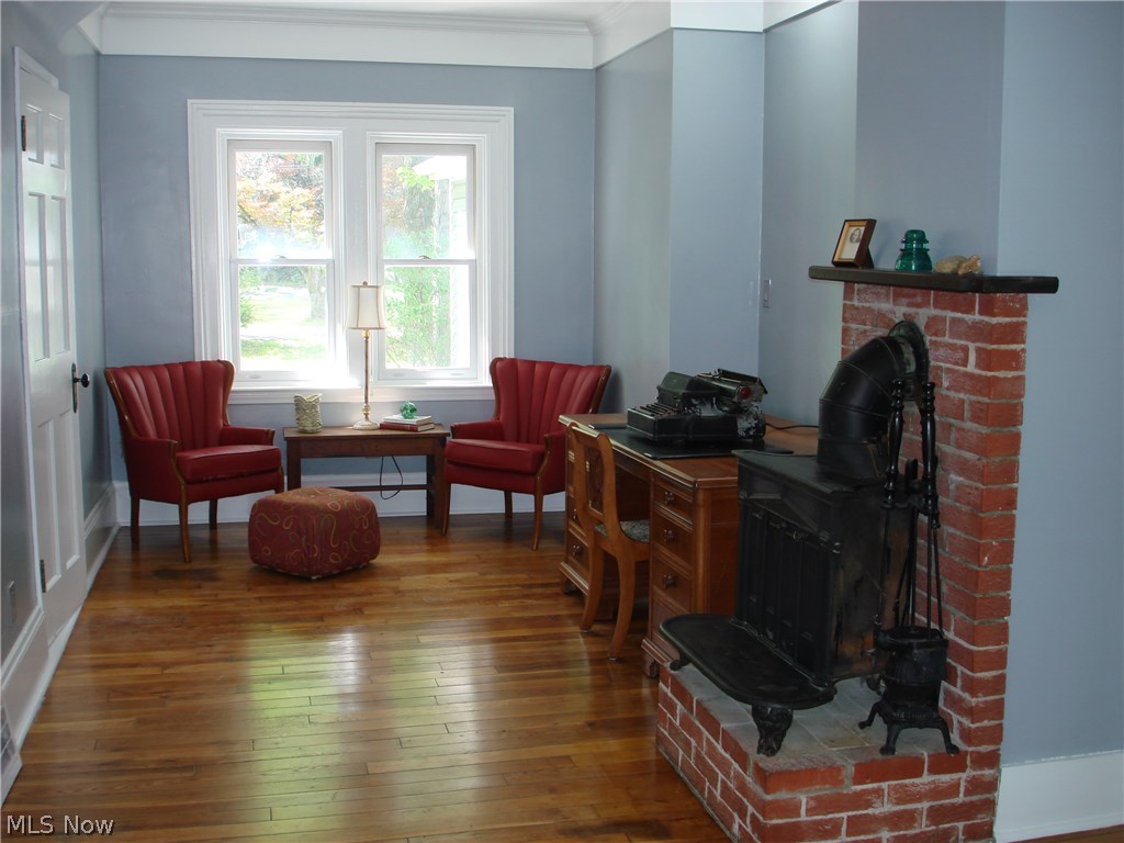 919 Richmond Road Cleveland, OH 44124 - Photo 10 of 35 Welcome to the parlor / office area! It can be a nice den, or sitting area....freshly painted and welcoming. Stove insert is just for show, disconnected...