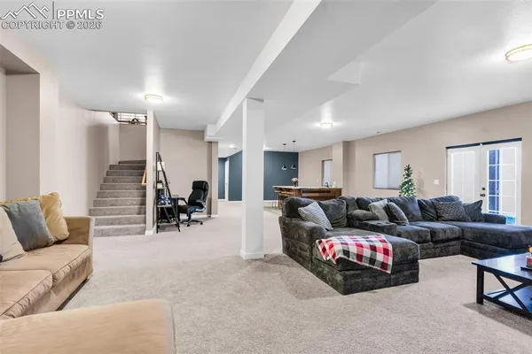 a living room with furniture and a couch