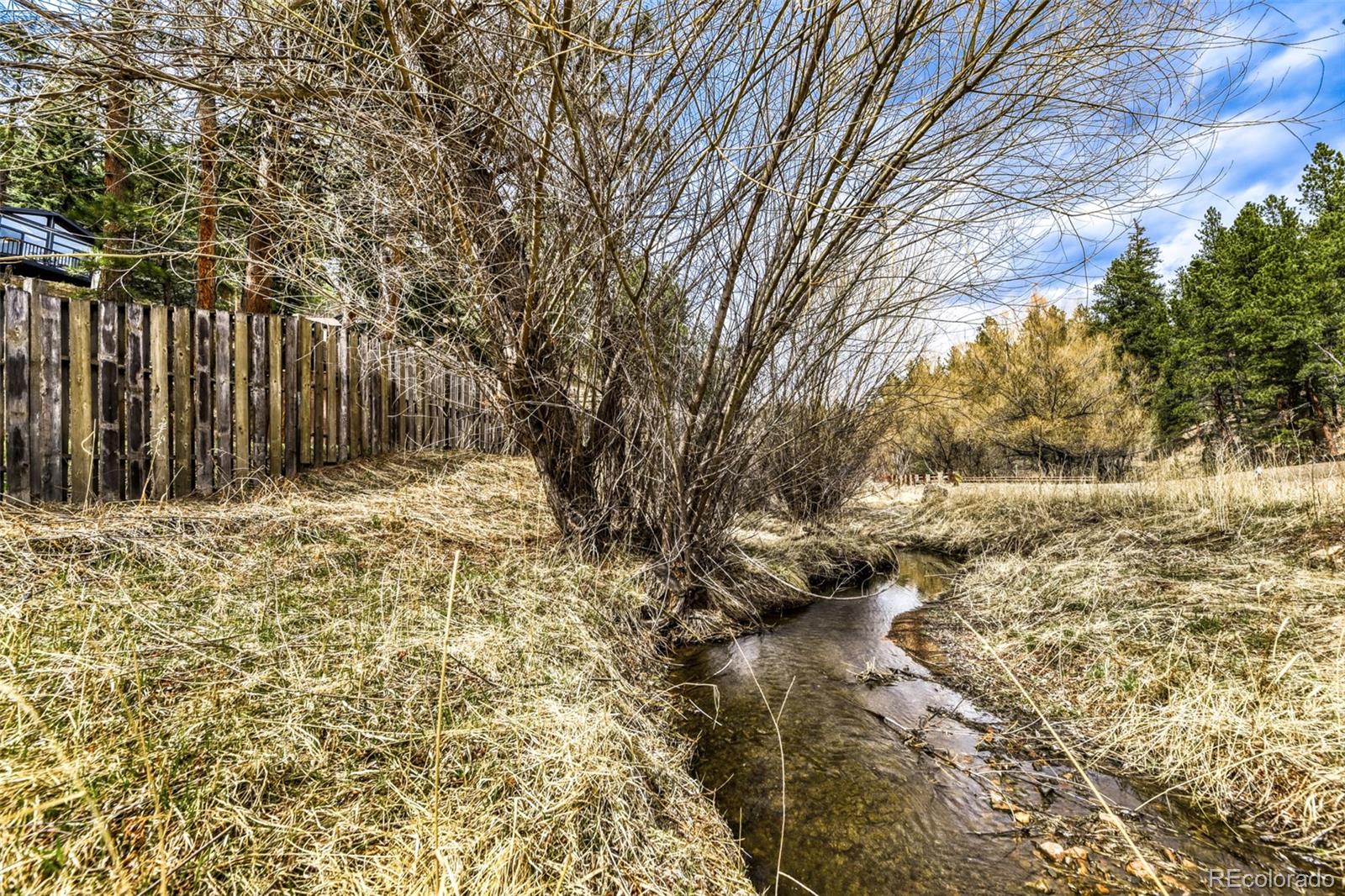 7489 South Turkey Creek Road Morrison, CO 80465 - Photo 4 of 28 a view of wooden fence