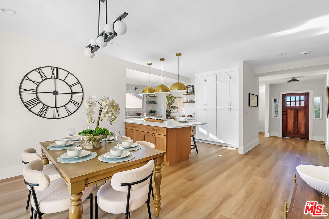 3492 Cabrillo Boulevard Los Angeles, CA 90066 - Photo 16 of 59 a view of a dining room with furniture and wooden floor