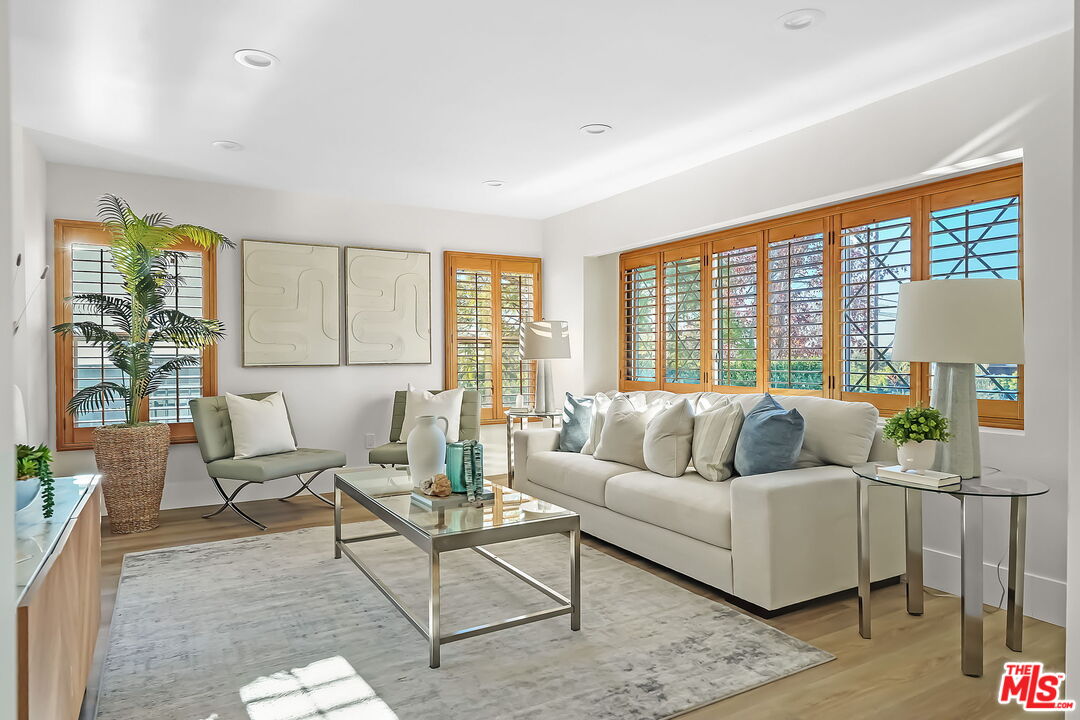 3492 Cabrillo Boulevard Los Angeles, CA 90066 - Photo 3 of 59 a living room with furniture and a large window