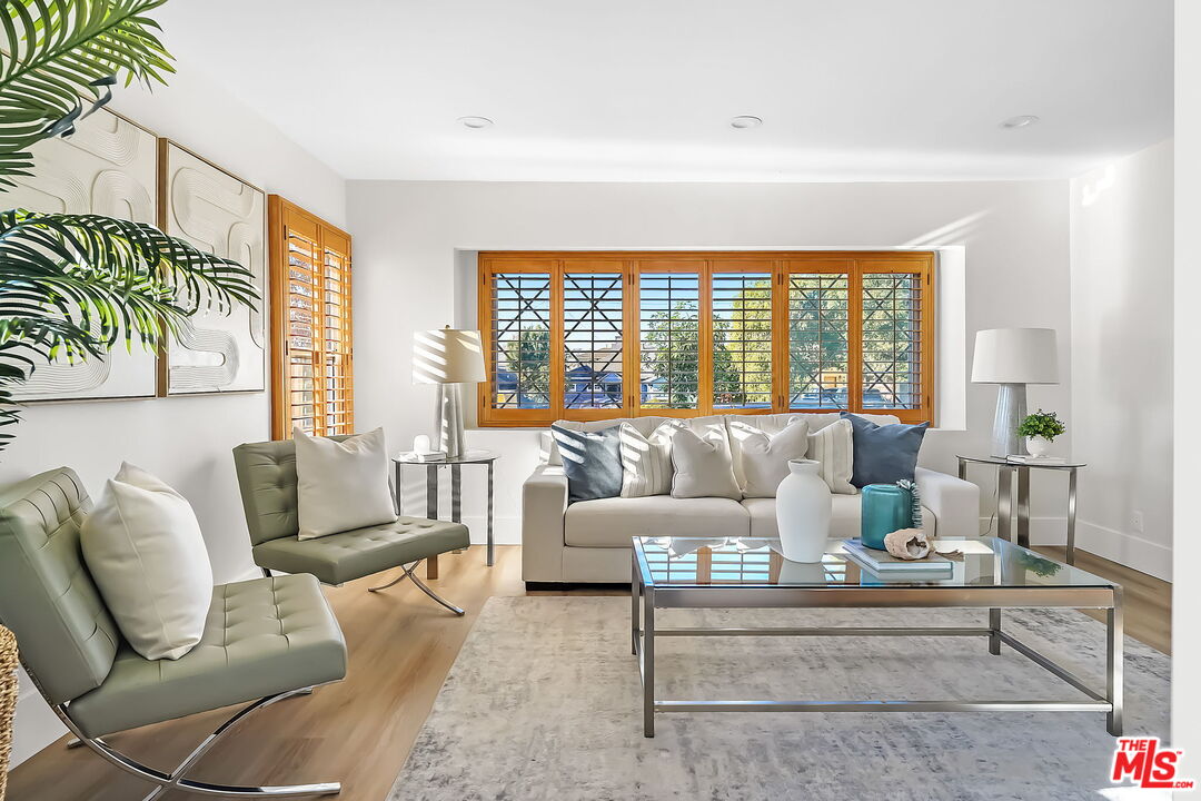 3492 Cabrillo Boulevard Los Angeles, CA 90066 - Photo 5 of 59 a living room with furniture and a large window