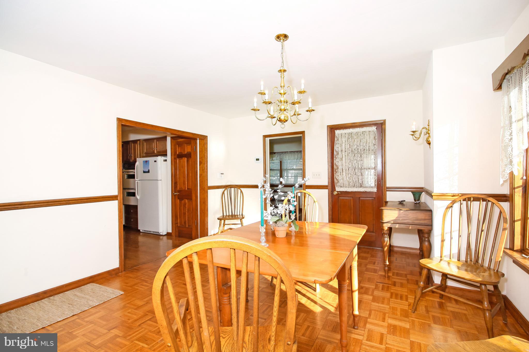 401 Georgetown Road Glassboro, NJ 08028 - Photo 19 of 64 a dining room with chandelier