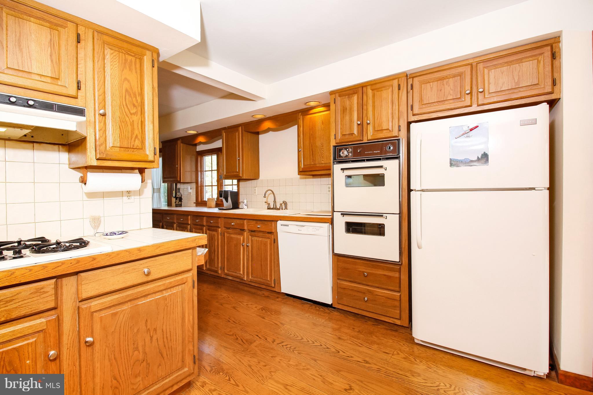 401 Georgetown Road Glassboro, NJ 08028 - Photo 25 of 64 a kitchen with stainless steel appliances a refrigerator sink and cabinets