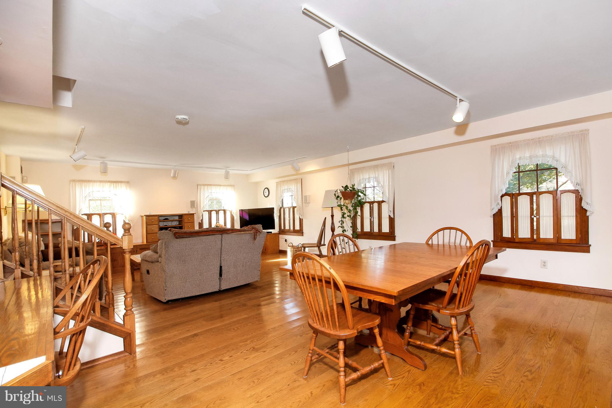 401 Georgetown Road Glassboro, NJ 08028 - Photo 27 of 64 a dining room with furniture and wooden floor