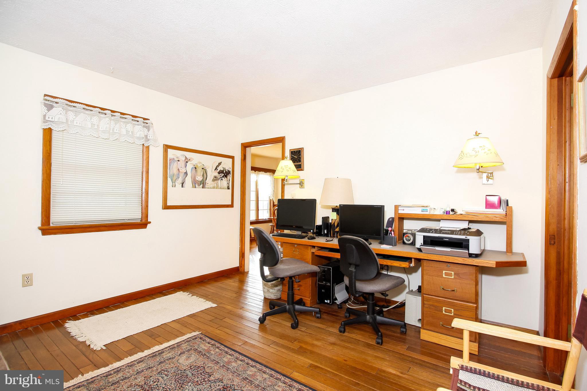 401 Georgetown Road Glassboro, NJ 08028 - Photo 36 of 64 a view of a workspace with furniture and a window