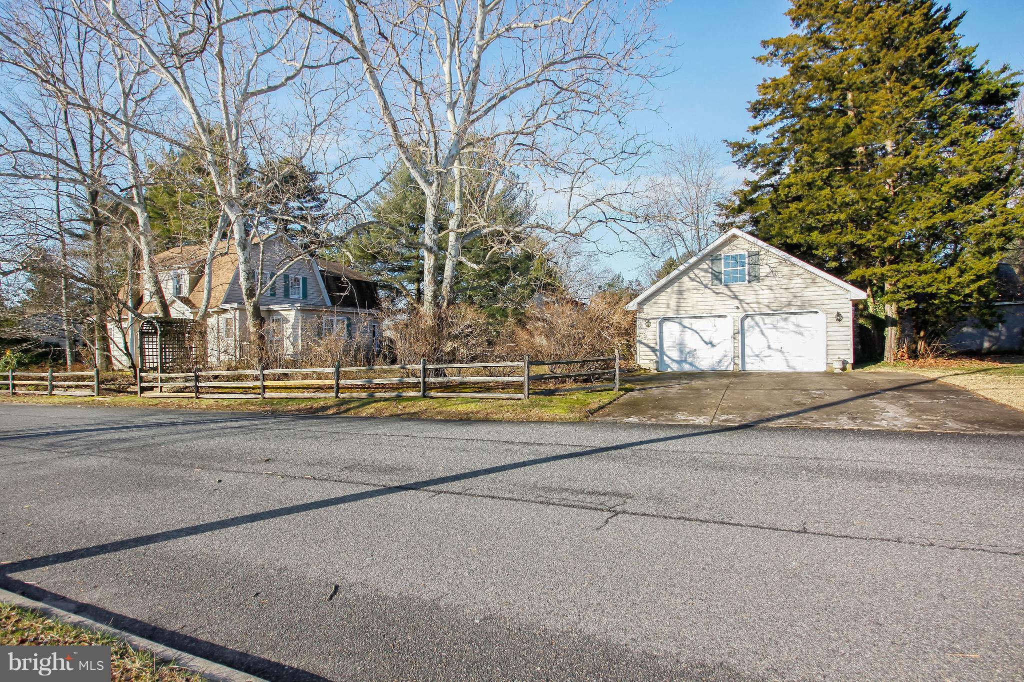 401 Georgetown Road Glassboro, NJ 08028 - Photo 5 of 64 a view of large house with a road and large trees