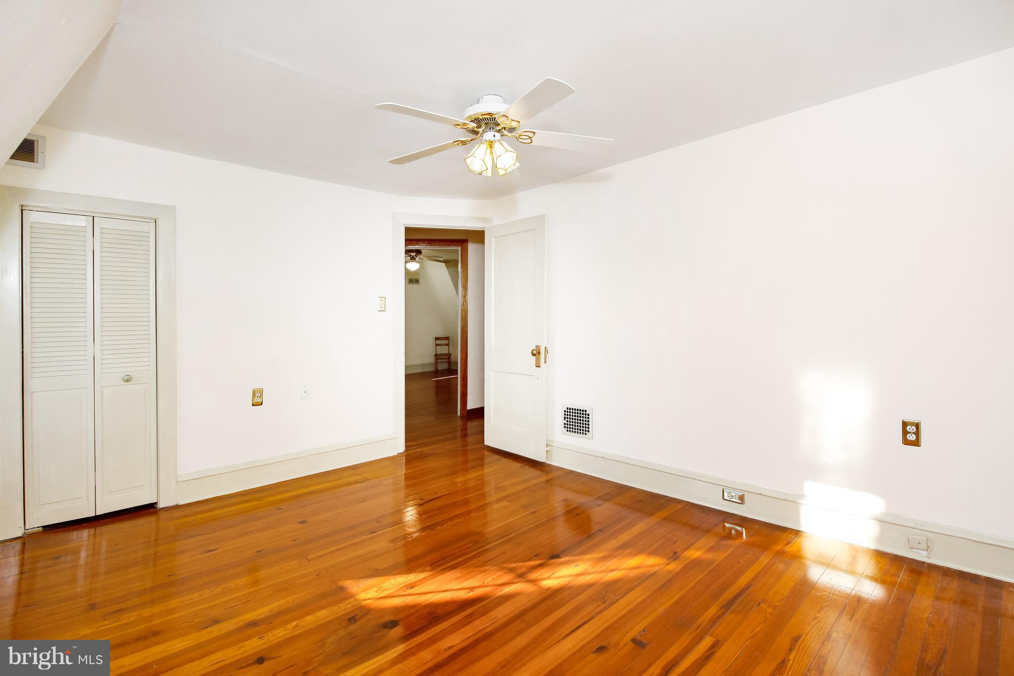 401 Georgetown Road Glassboro, NJ 08028 - Photo 47 of 64 a view of an empty room with wooden floor