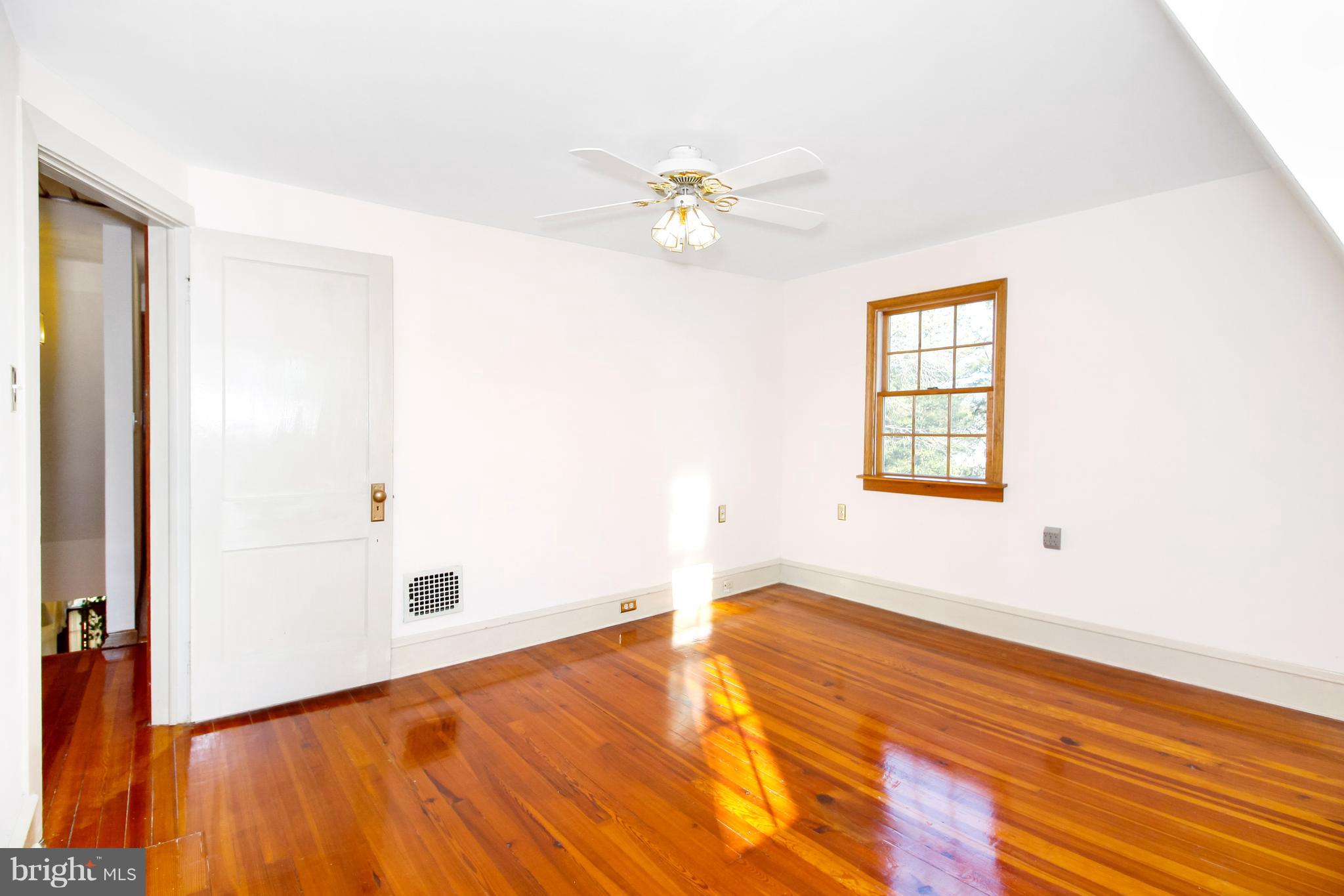 401 Georgetown Road Glassboro, NJ 08028 - Photo 48 of 64 wooden floor in an empty room with a window