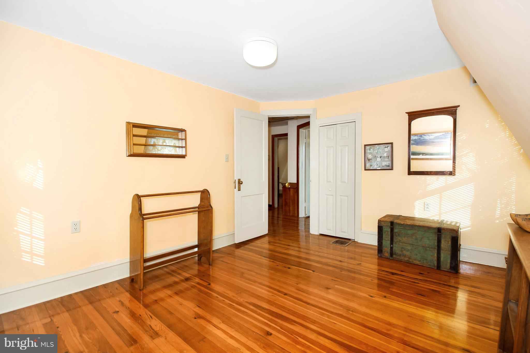 401 Georgetown Road Glassboro, NJ 08028 - Photo 51 of 64 a view of an empty room with wooden floor
