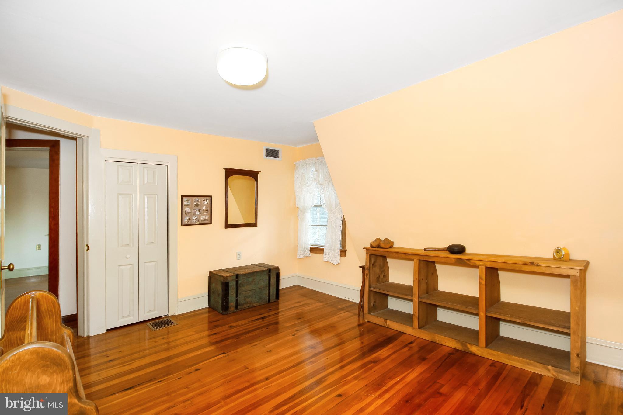 401 Georgetown Road Glassboro, NJ 08028 - Photo 52 of 64 a view of living room with furniture and wooden floor