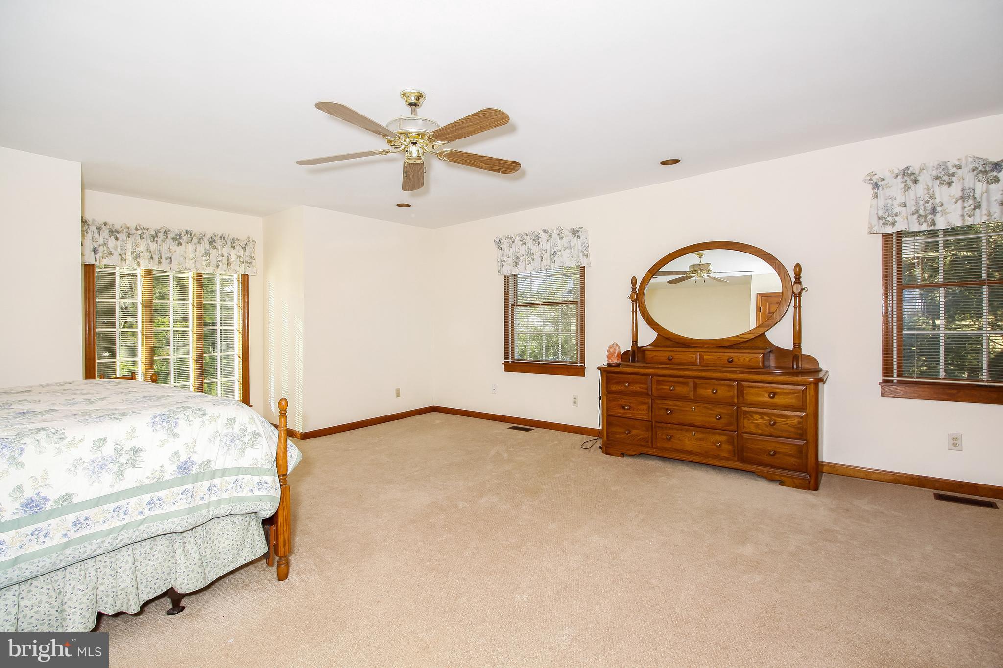 401 Georgetown Road Glassboro, NJ 08028 - Photo 61 of 64 a living room with furniture a window and a chandelier