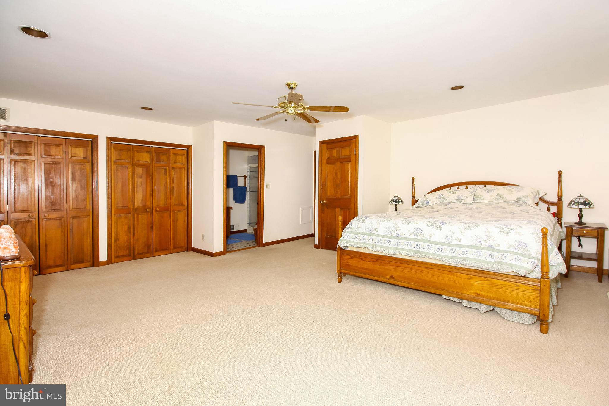 401 Georgetown Road Glassboro, NJ 08028 - Photo 63 of 64 a bedroom with a bed and a table