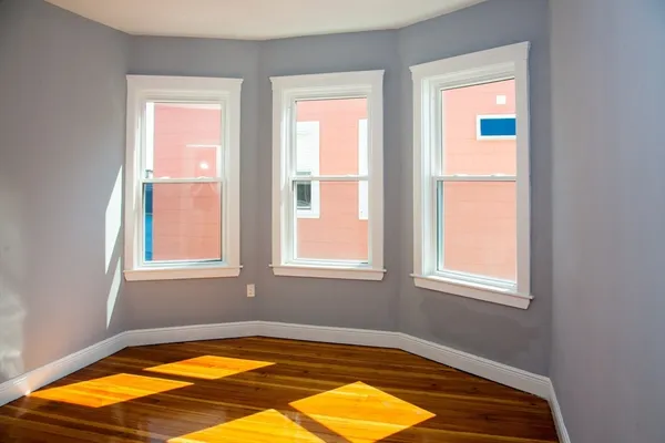 a view of a room with a windows