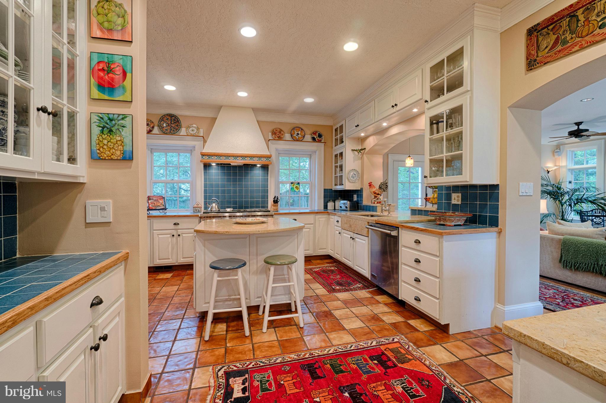 3615 North Glebe Road Arlington, VA 22207 - Photo 11 of 30 a kitchen with stainless steel appliances kitchen island granite countertop a sink and cabinets