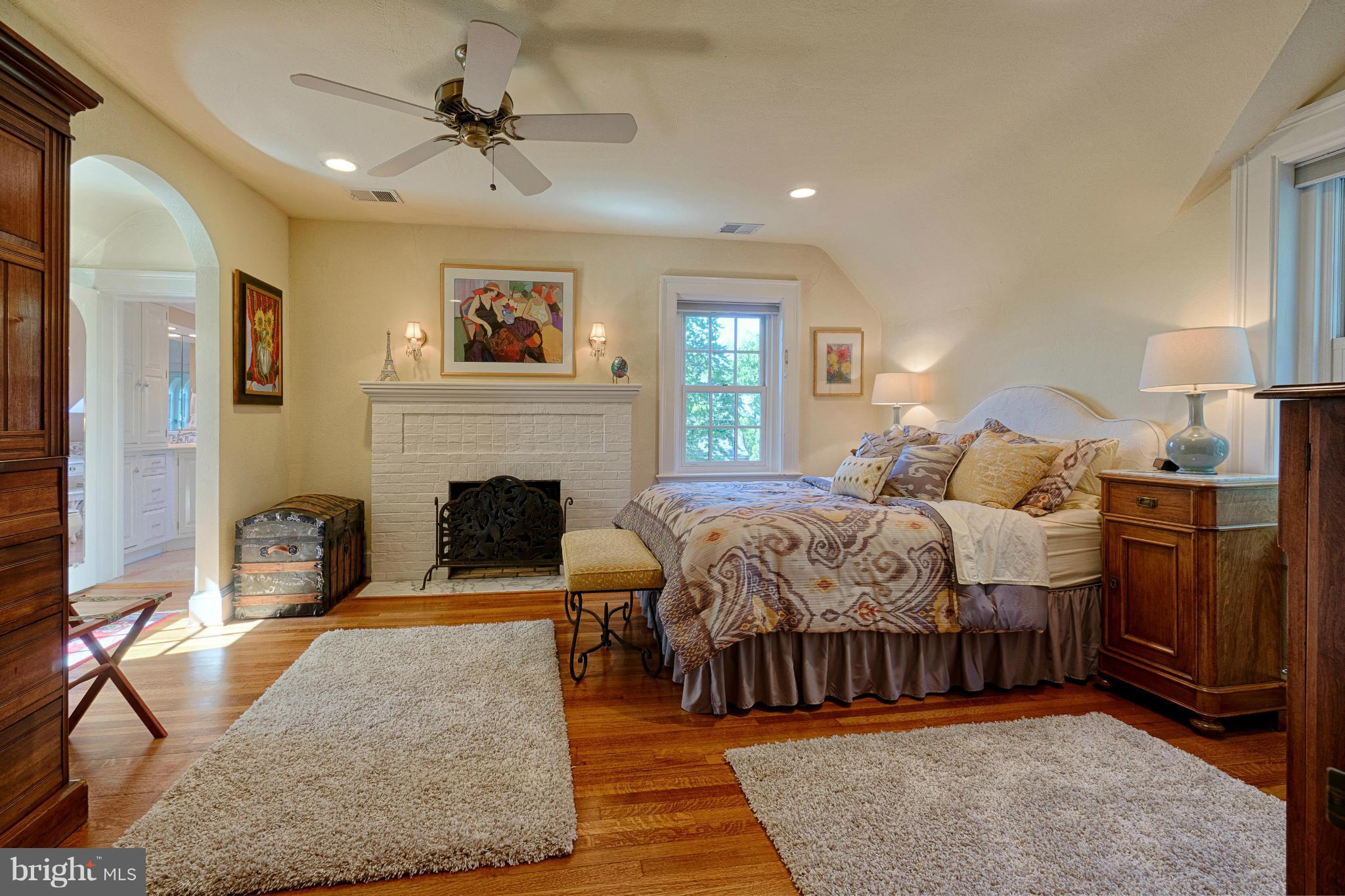 3615 North Glebe Road Arlington, VA 22207 - Photo 23 of 30 a bedroom with a bed and a fireplace