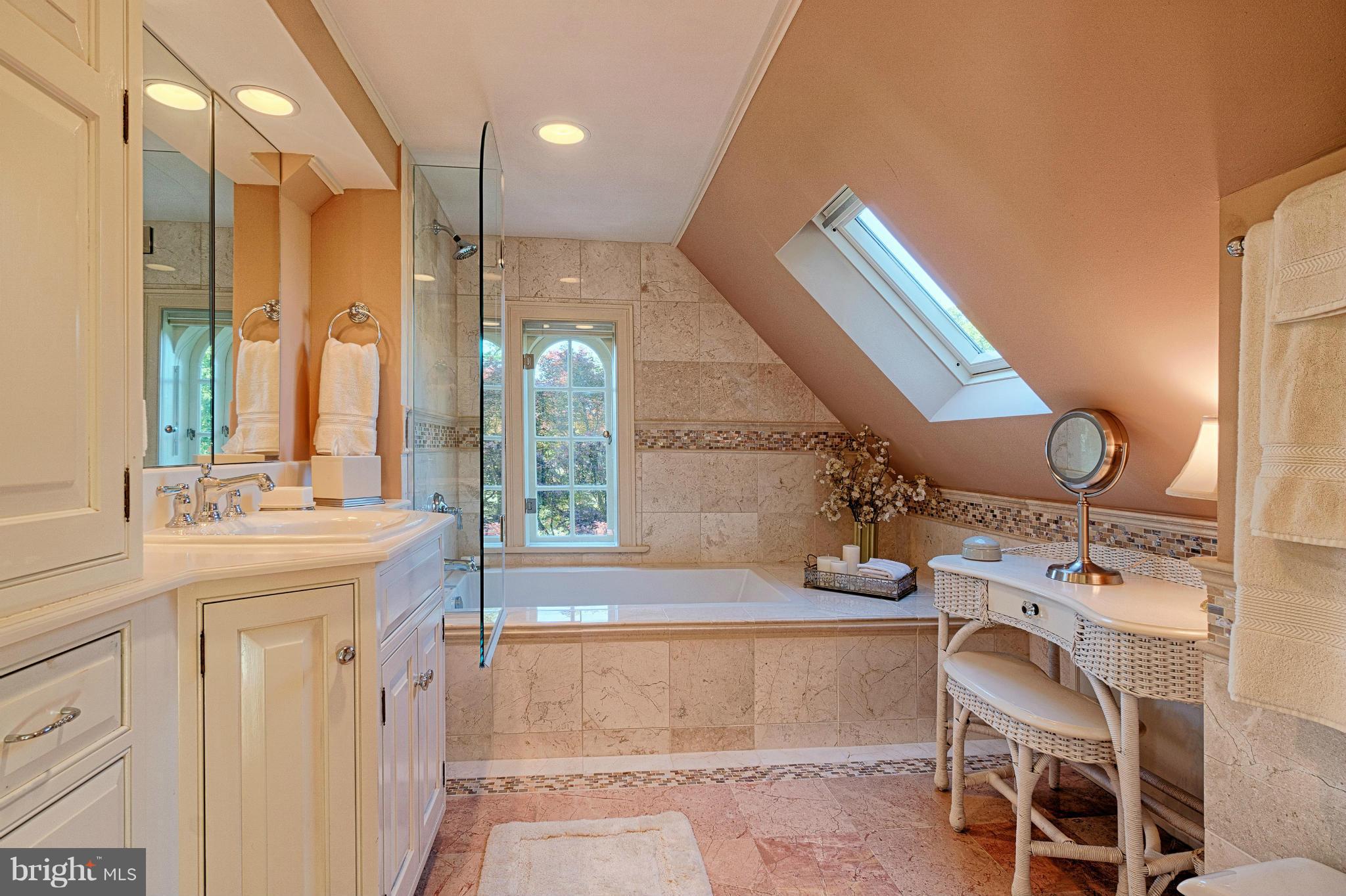 3615 North Glebe Road Arlington, VA 22207 - Photo 24 of 30 a bathroom with a sink mirror and a bathtub