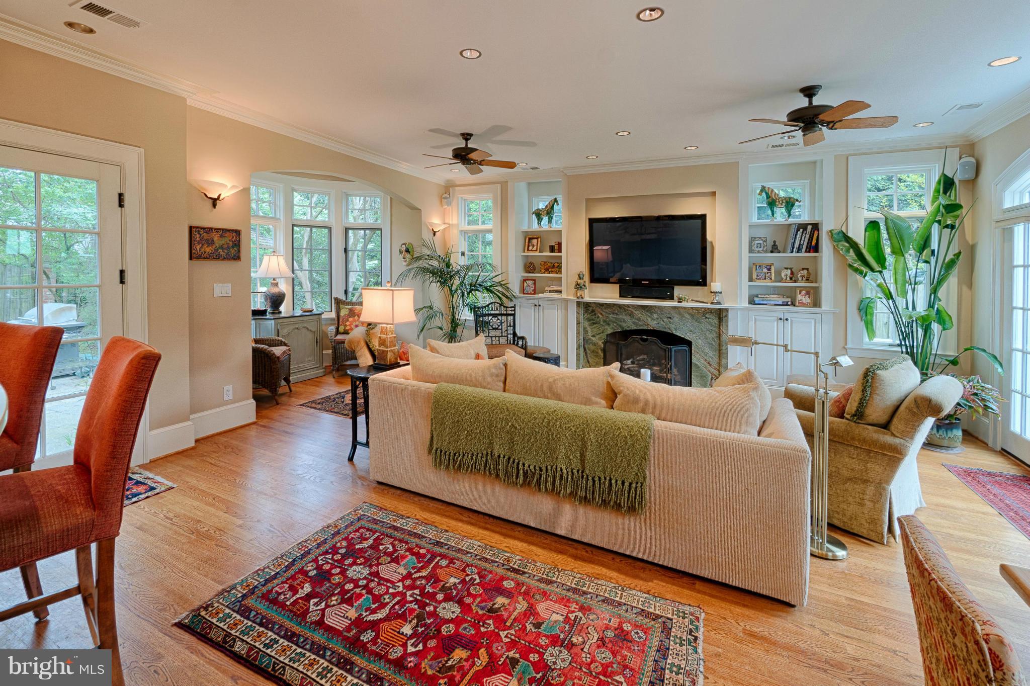 3615 North Glebe Road Arlington, VA 22207 - Photo 8 of 30 a living room with furniture a flat screen tv and a fireplace