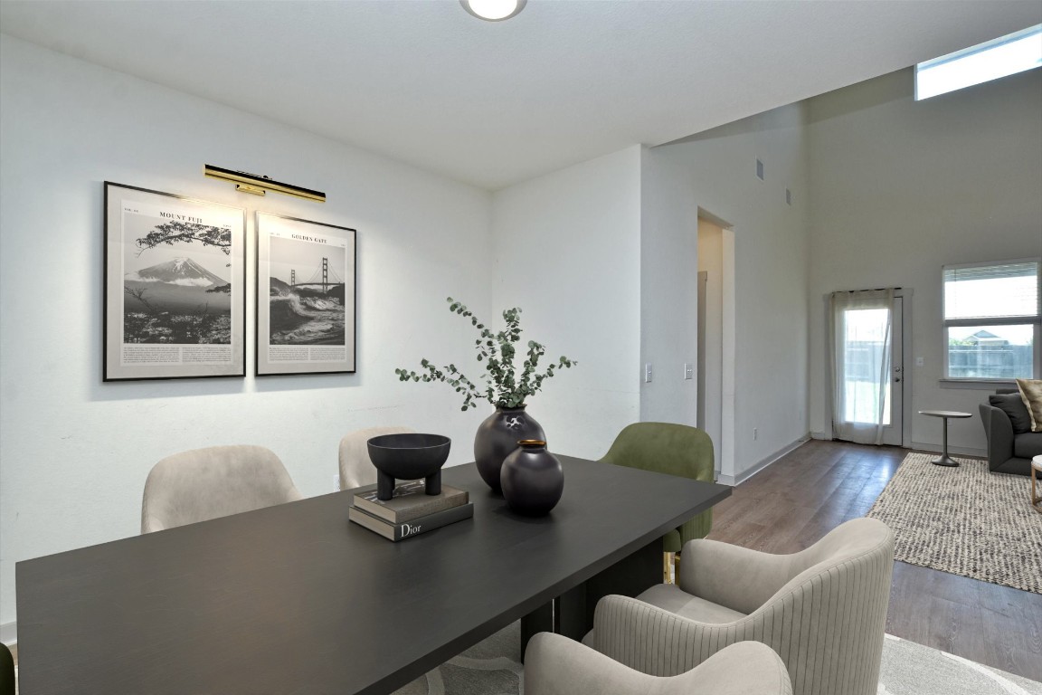 3462 Flowstone Lane Round Rock, TX 78681 - Photo 12 of 33 a dining room with furniture and wooden floor