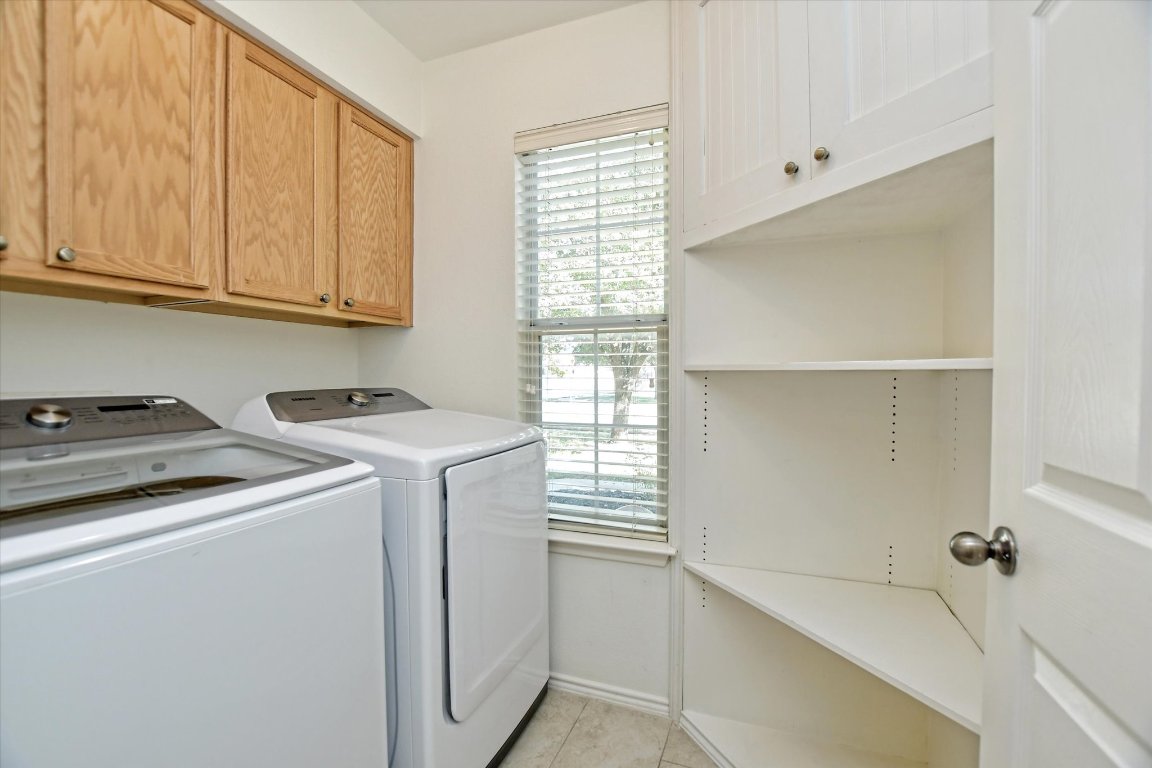 3462 Flowstone Lane Round Rock, TX 78681 - Photo 17 of 33 a utility room with dryer and washer
