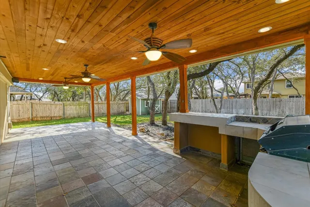 a view of swimming pool with outdoor seating