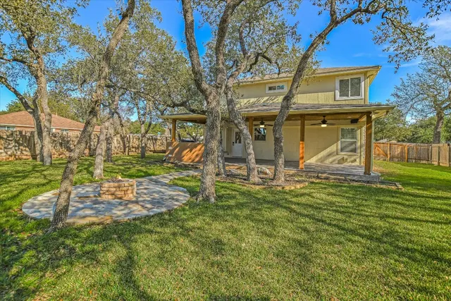 a view of a yard in front of a house