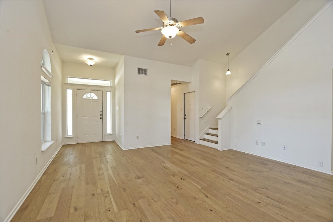 3462 Flowstone Lane Round Rock, TX 78681 - Photo 6 of 33 a view of empty room with wooden floor