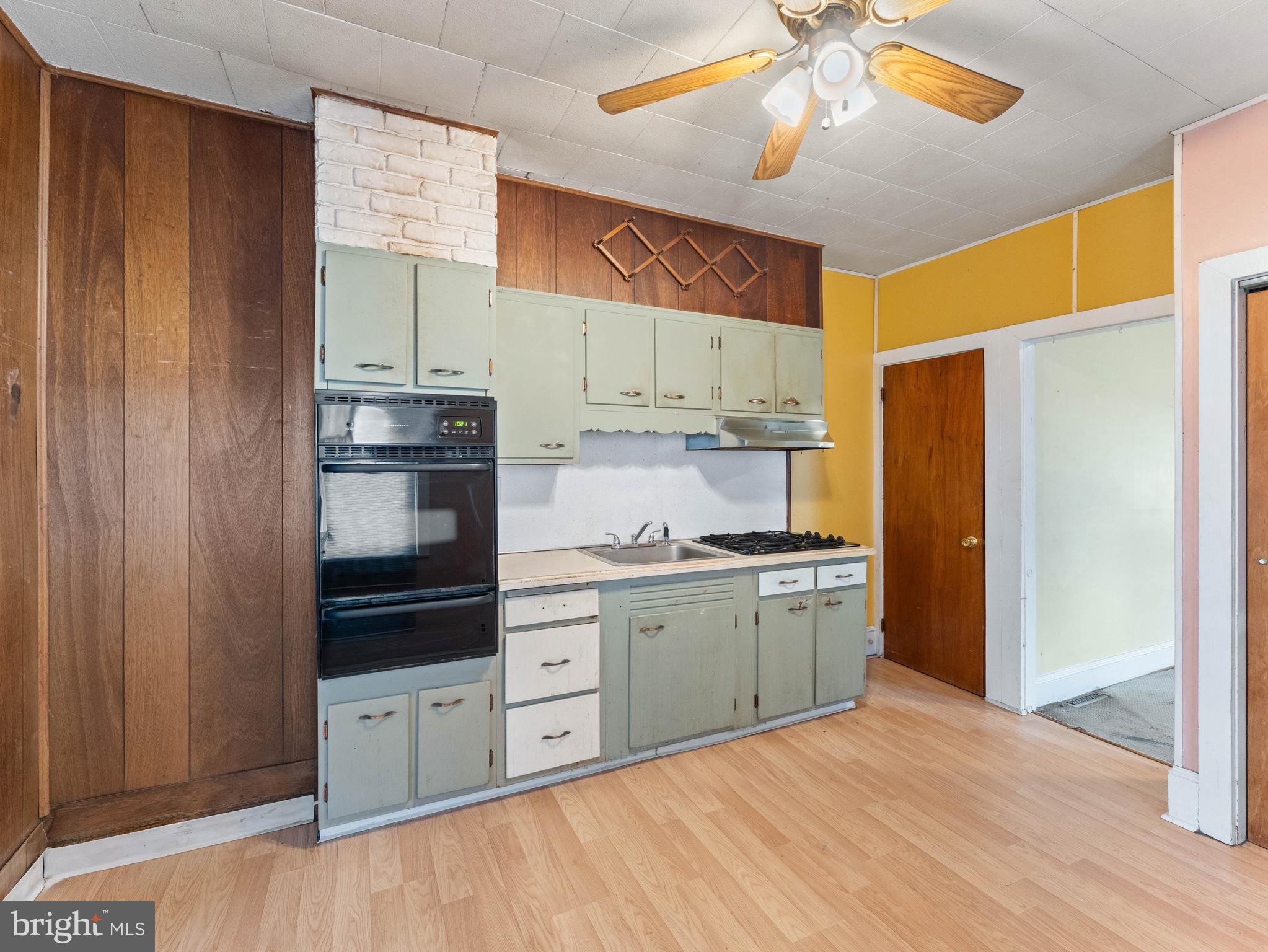 700 Chestnut Street Delanco, NJ 08075 - Photo 11 of 31 a kitchen with stainless steel appliances a stove refrigerator and cabinets