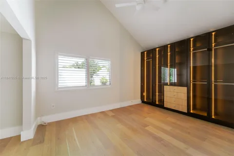 a view of a hallway with washer and dryer