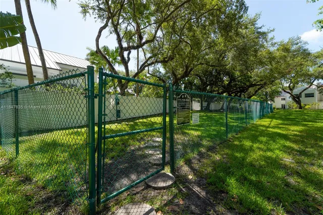 a picture of a wall with a bench and a picture