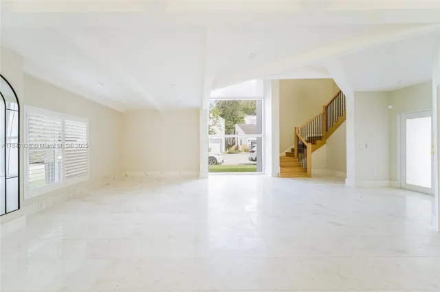 a view of a kitchen with a sink