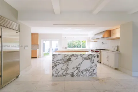 a large white room with a large window