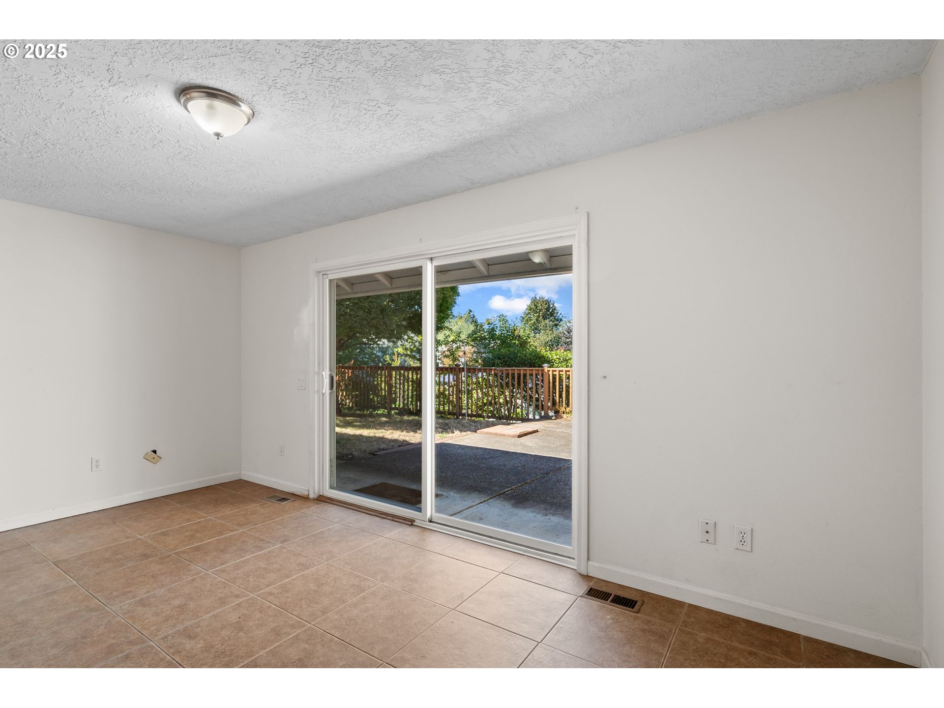 3285 Northeast 5th Street Gresham, OR 97030 - Photo 14 of 35 a view of an empty room with a window