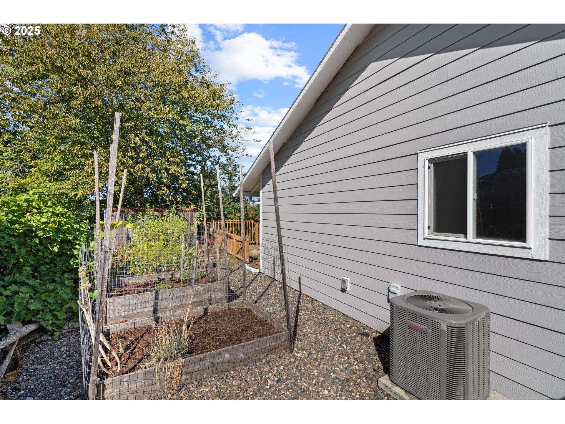 3285 Northeast 5th Street Gresham, OR 97030 - Photo 31 of 35 a view of a porch with a bench in patio