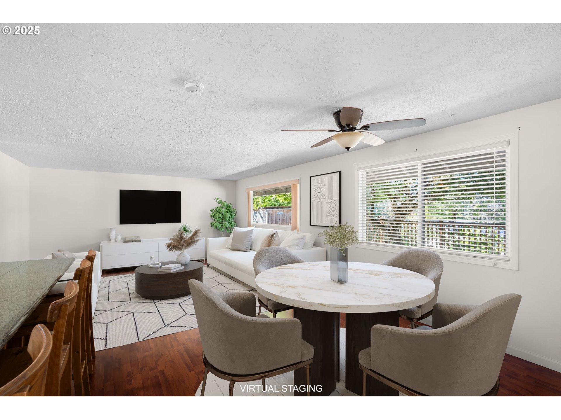 3285 Northeast 5th Street Gresham, OR 97030 - Photo 10 of 35 a living room with furniture and a flat screen tv