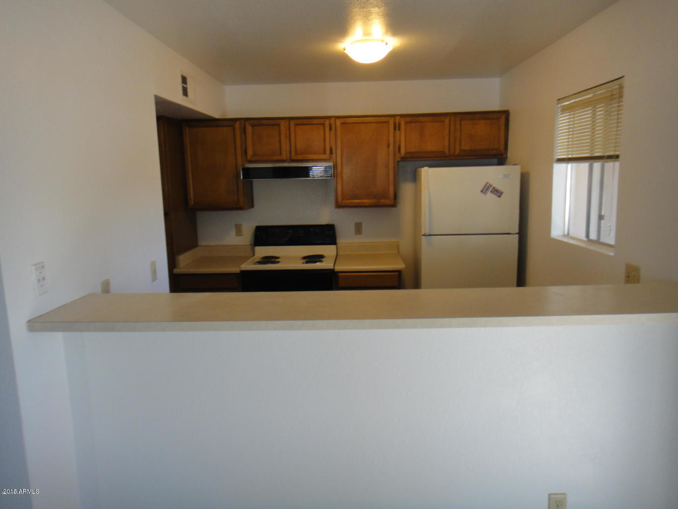 623 West Guadalupe Road, Unit 237 Mesa, AZ 85210 - Photo 8 of 20 237 kitchen & breakfast bar