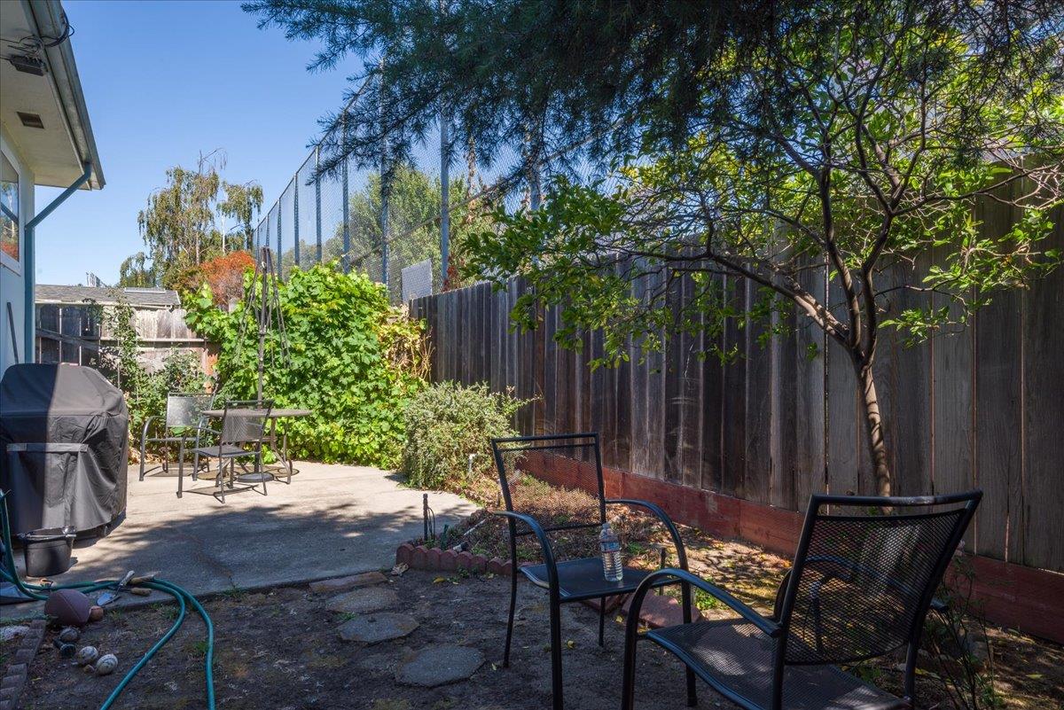 1927 Palm Avenue San Mateo, CA 94403 - Photo 11 of 19 a view of a chairs and table in a backyard