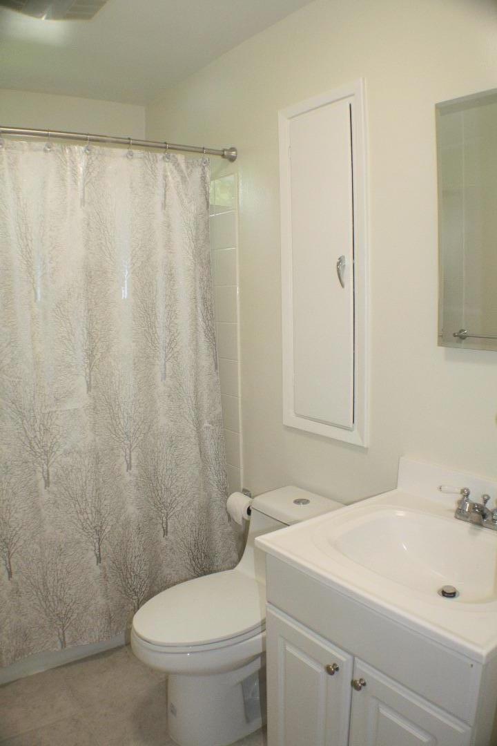 1927 Palm Avenue San Mateo, CA 94403 - Photo 17 of 19 a bathroom with a sink a toilet and shower