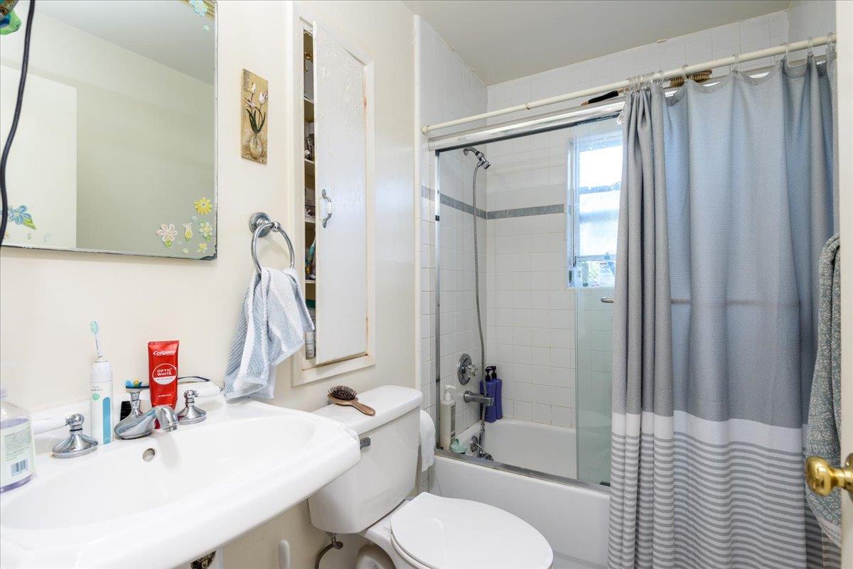 1927 Palm Avenue San Mateo, CA 94403 - Photo 8 of 19 a bathroom with a sink toilet and shower