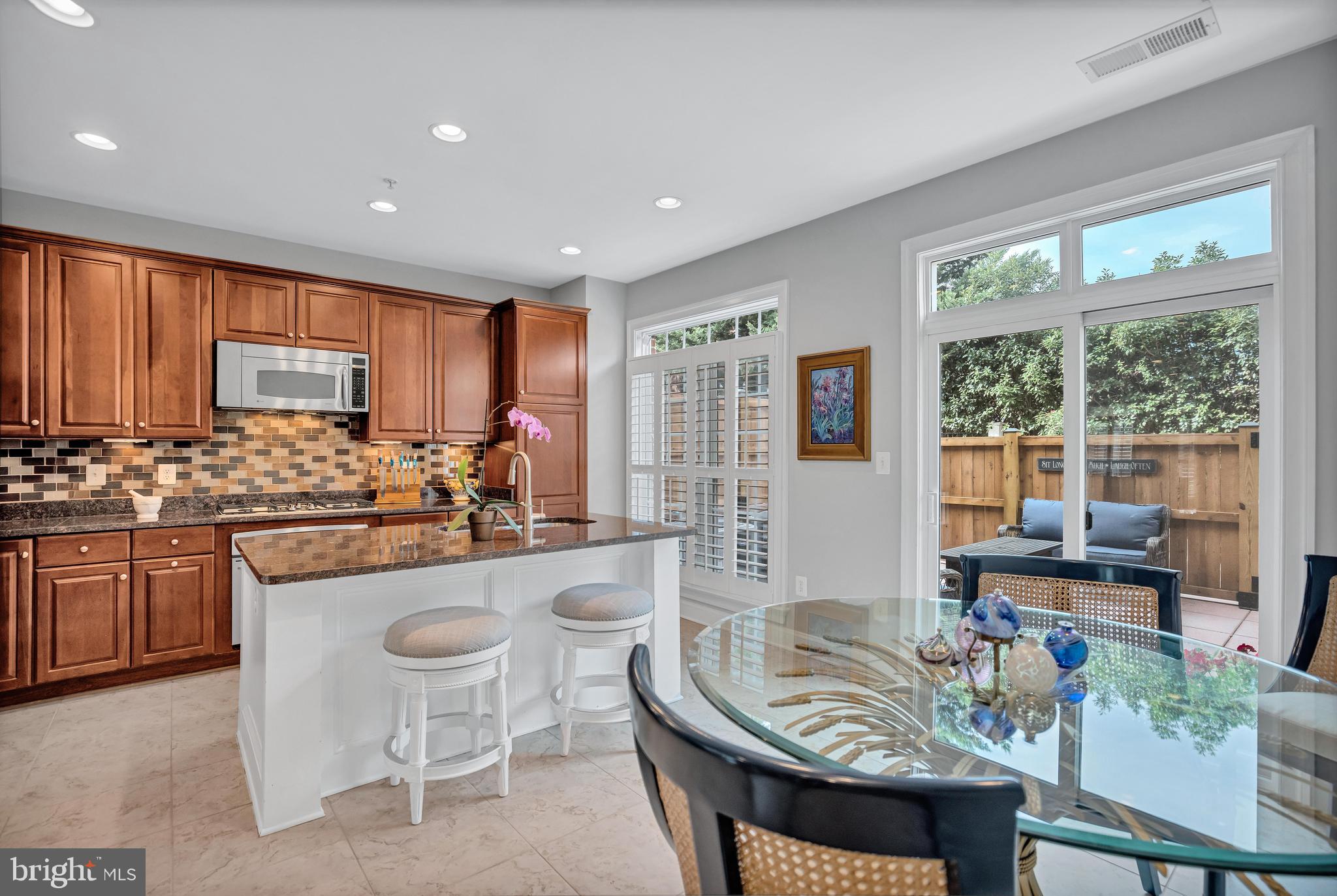 1511 Portner Road Alexandria, VA 22314 - Photo 11 of 67 Undermount Lighting & Glass Subway Tile Backsplash